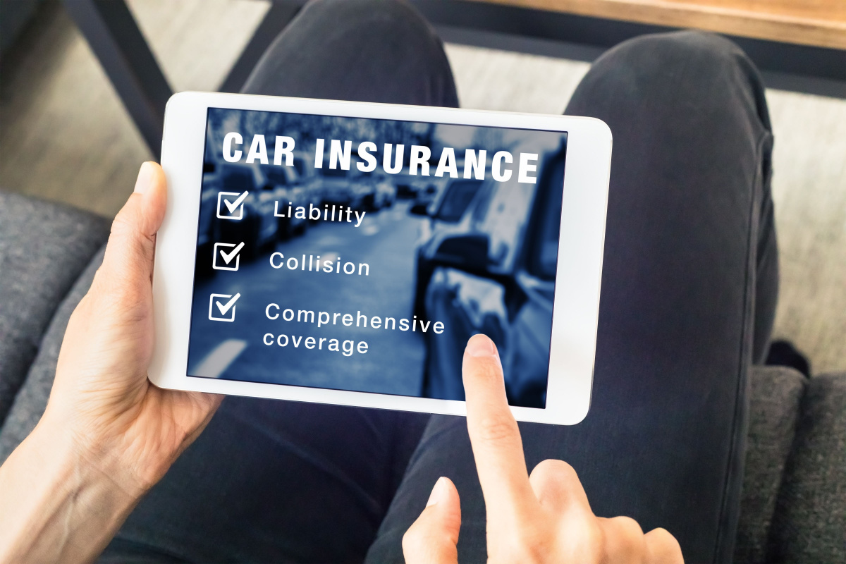 Individual choosing car insurance coverage types online