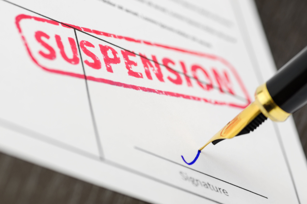Close up on suspension paperwork