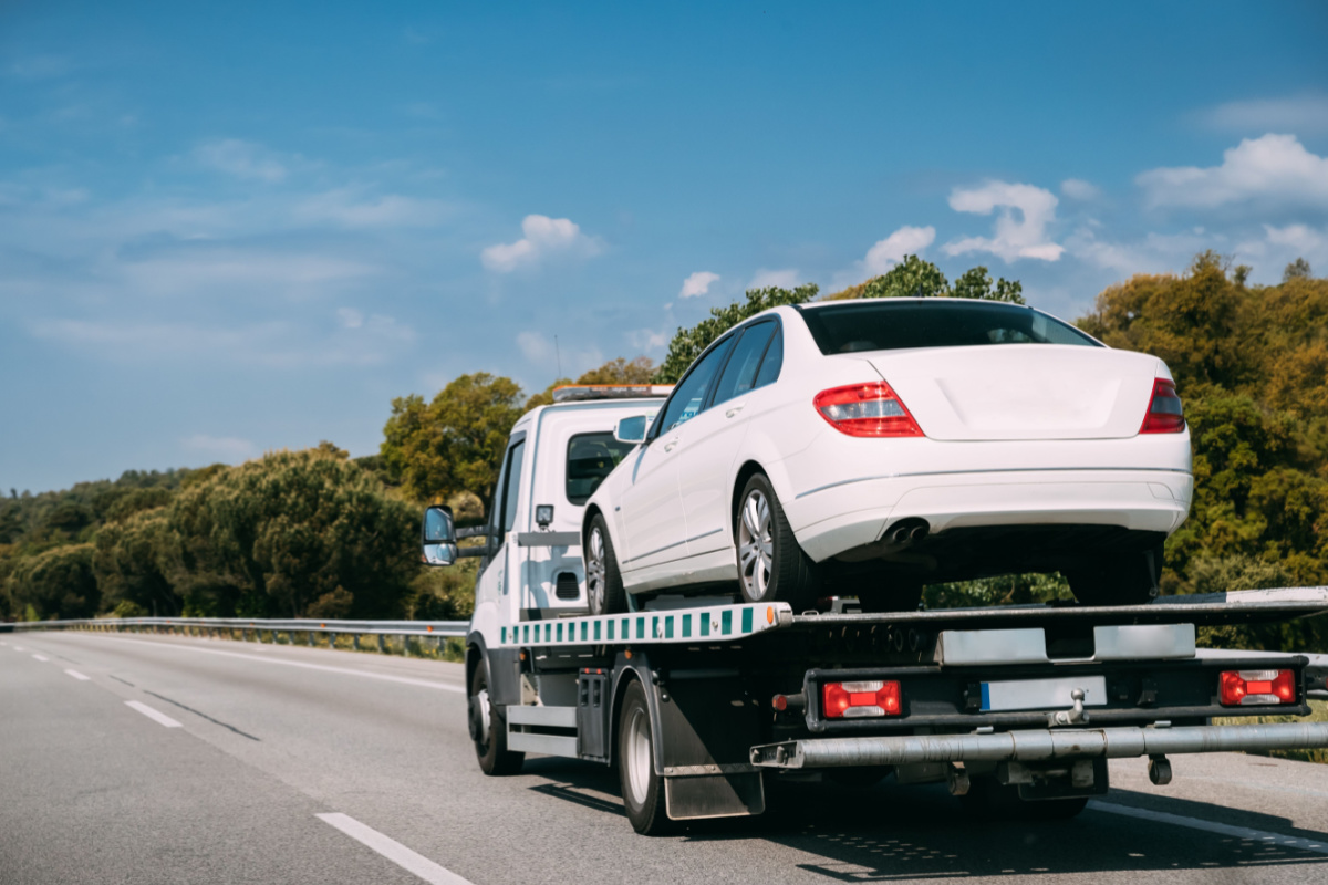 Tow truck towing car